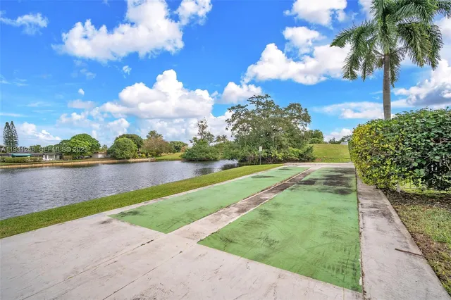 a view of a lake and green space
