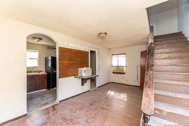 an aerial view of house with yard