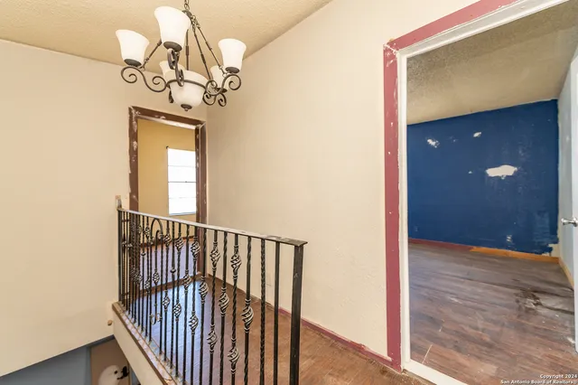 a bathroom with a tub sink and a mirror