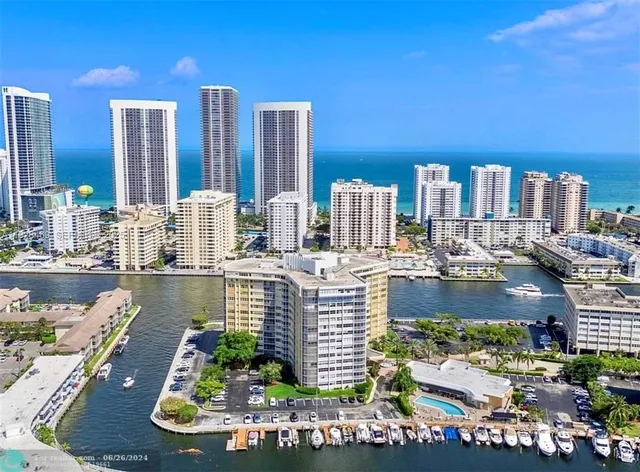 a large building with a view of lake
