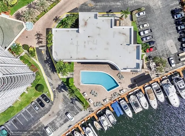an aerial view of a house with outdoor space