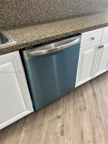 a close view of sink and microwave