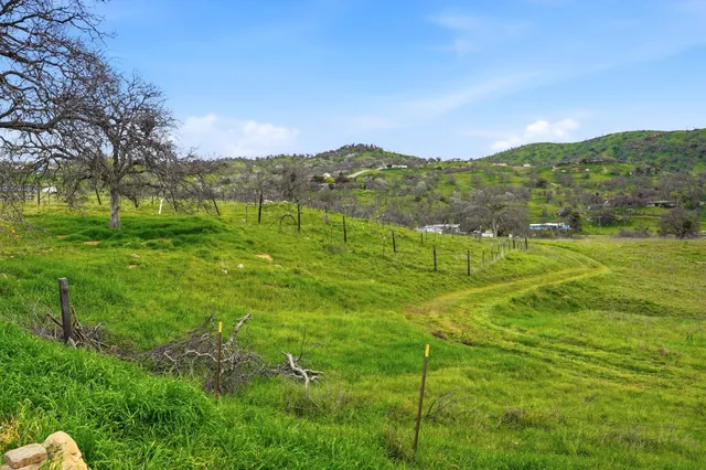 a view of a big room with an outdoor space and seating