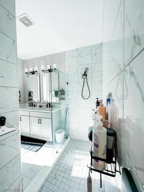 7537 Carnegie Way Naples, FL 34119 - Photo 17 of 35 a room with white cabinets and white walls