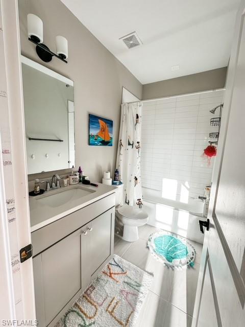 7537 Carnegie Way Naples, FL 34119 - Photo 21 of 35 a kitchen with a sink appliances and cabinets
