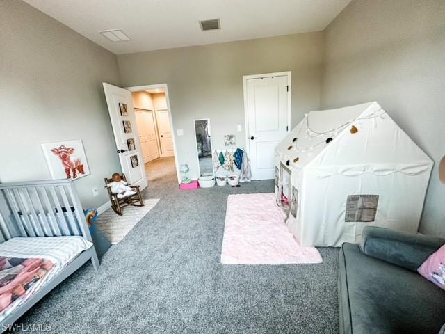 7537 Carnegie Way Naples, FL 34119 - Photo 23 of 35 a living room with furniture and a couch