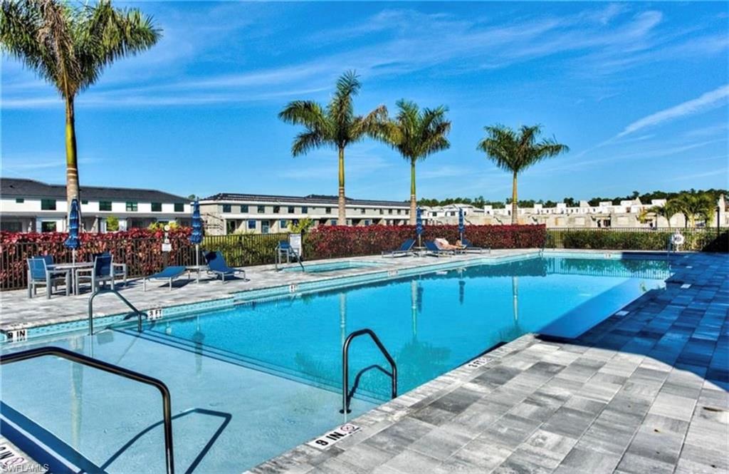 7537 Carnegie Way Naples, FL 34119 - Photo 34 of 35 a view of outdoor space and seating area