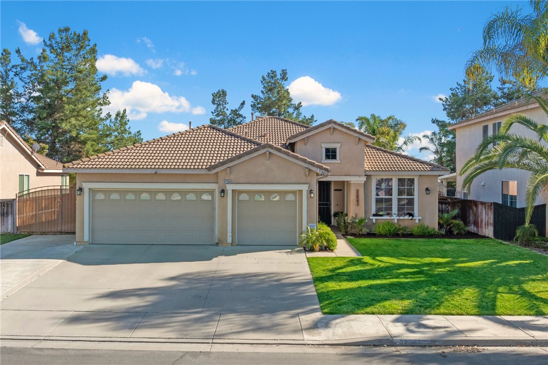 32341 Perigord Road Winchester, CA 92596 - Photo 1 of 1 a front view of house with yard and green space