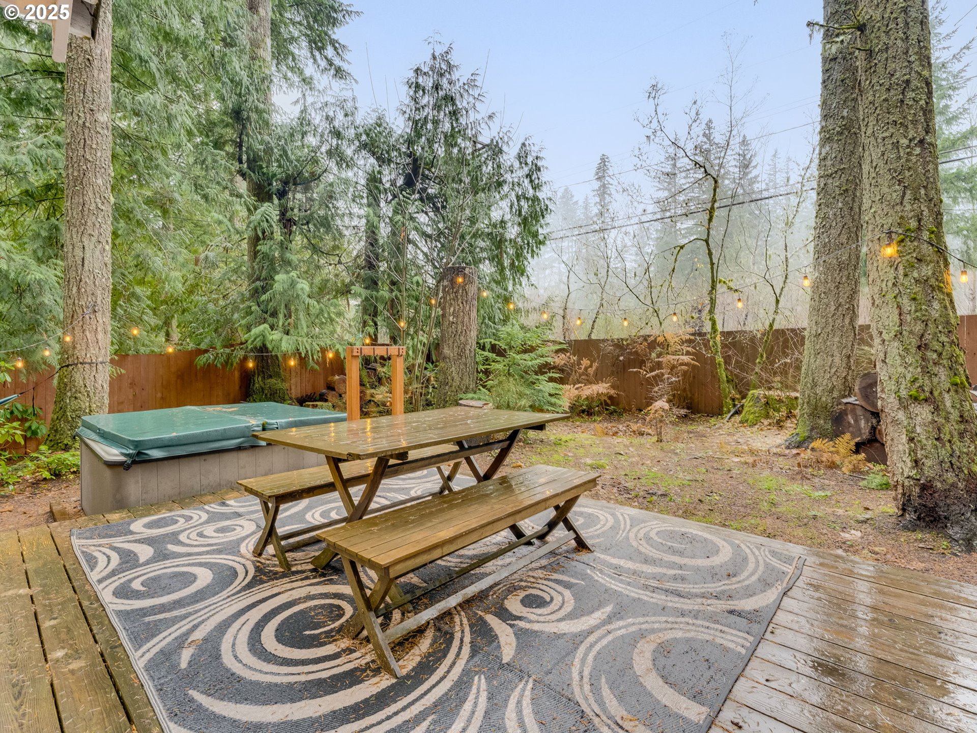 71597 East Minikahda Avenue Rhododendron, OR 97049 - Photo 19 of 26 a view of a backyard with sitting area