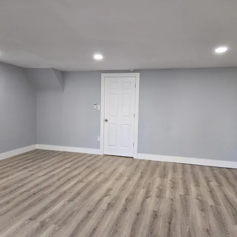 a bathroom with a sink toilet and a mirror