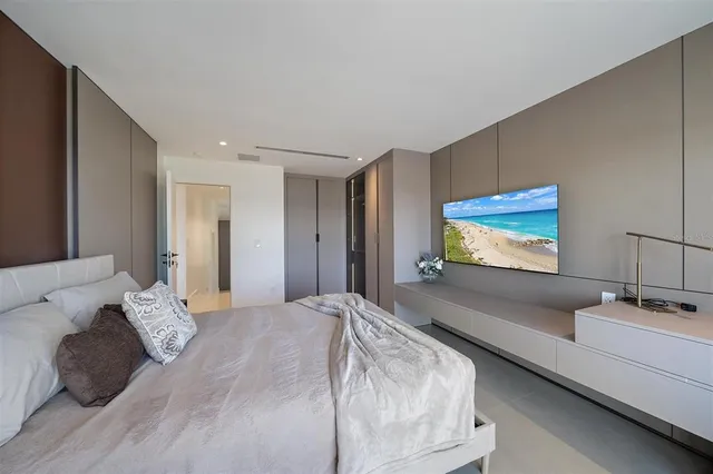 a bathroom with a sink vanity and mirror