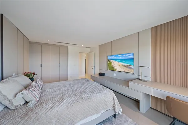 a room with furniture and a flat screen tv