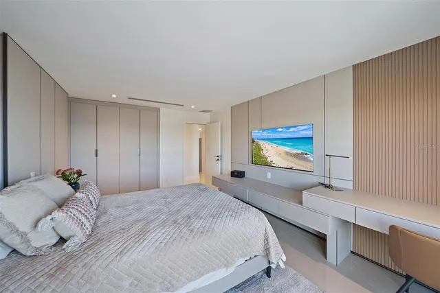 a room with furniture and a flat screen tv