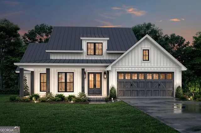 front view of a house with a yard