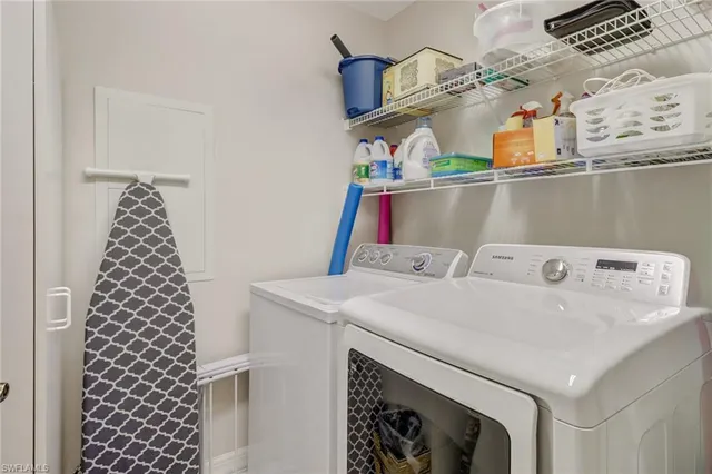 a utility room with dryer and washer
