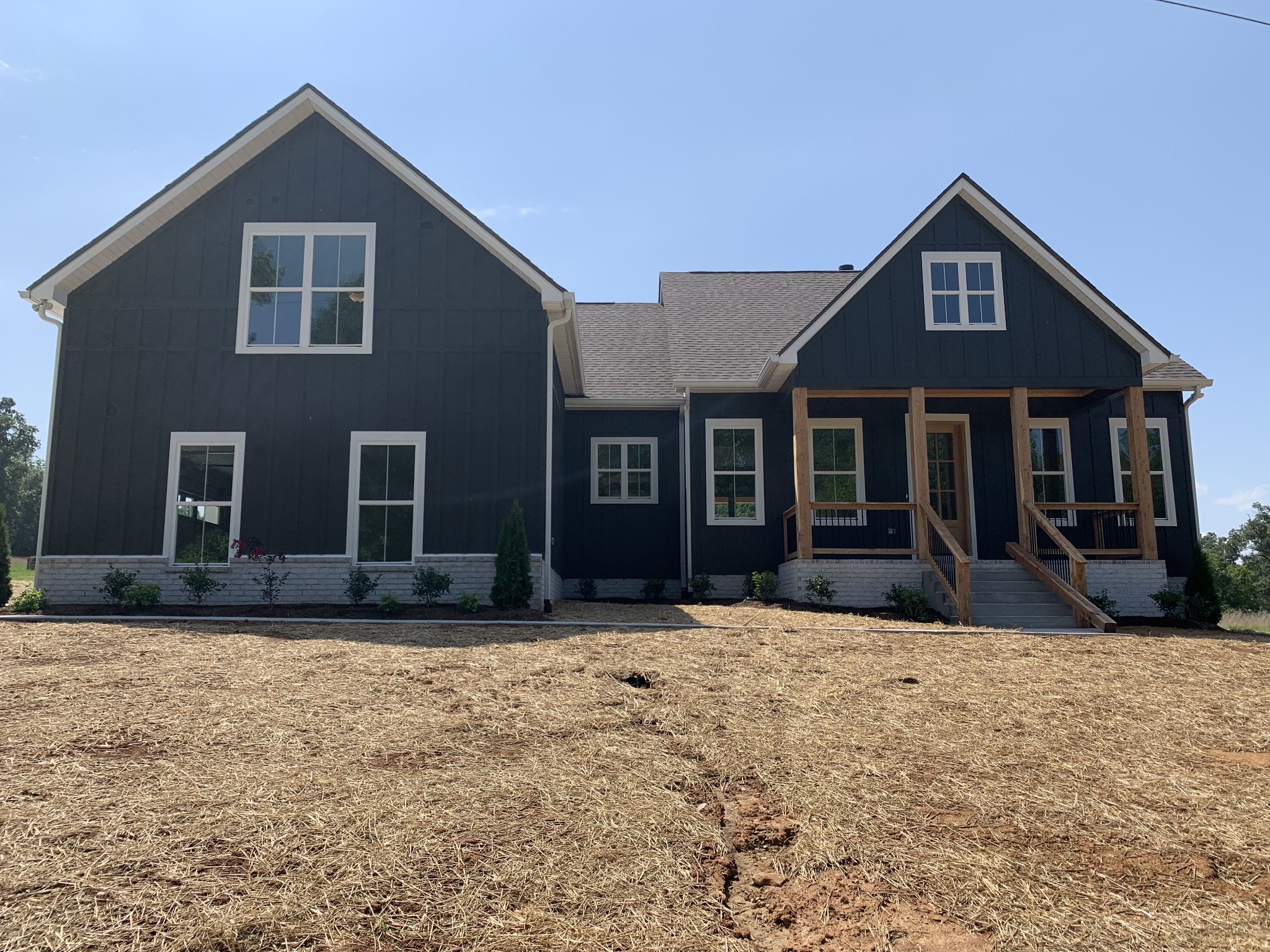 1798 Old Gallatin Road Portland, TN 37148 - Photo 1 of 35 a front view of a house with a yard