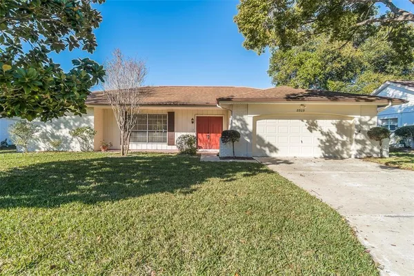 front view of a house with a yard