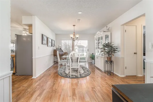 a view of a dining room with furniture