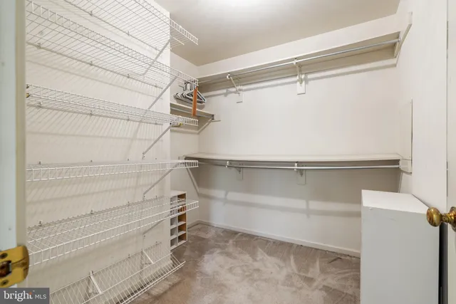 a view of a bathroom with a tub and a sink