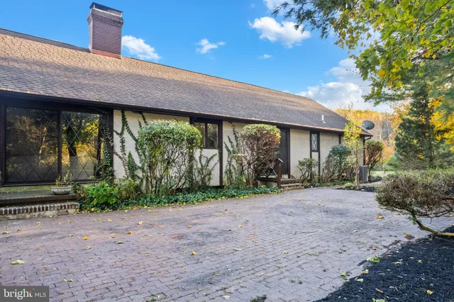 a view of a field with an trees
