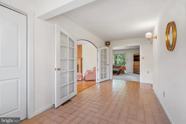 a view of a livingroom from a hallway