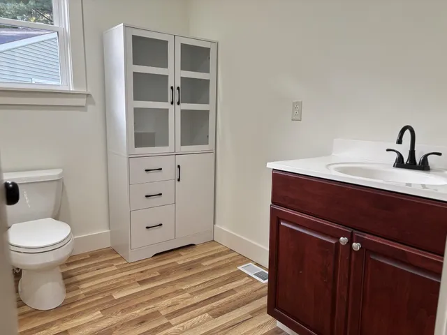 a bathroom with a sink and a toilet