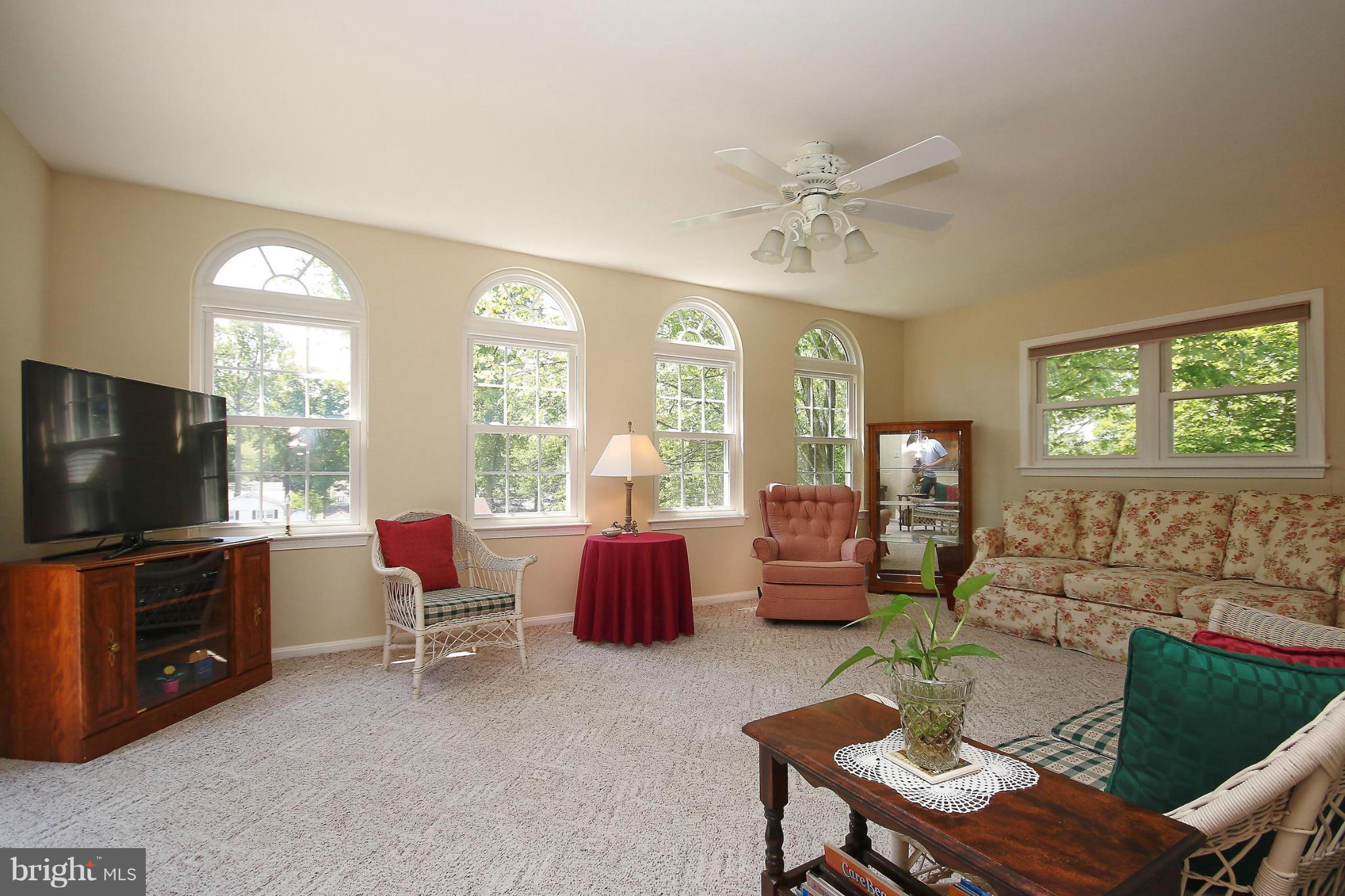 7927 Ellet Road Springfield, VA 22151 - Photo 12 of 30 a living room with furniture and a flat screen tv
