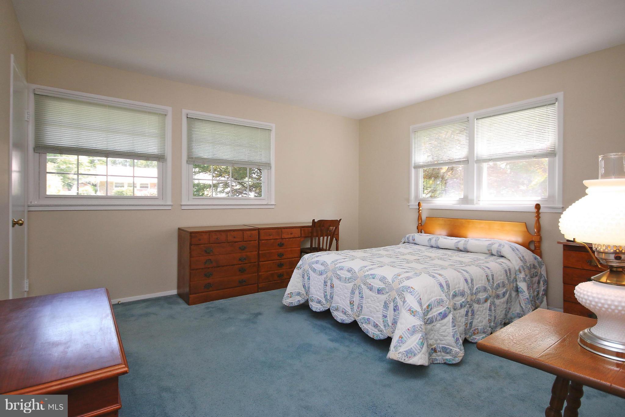 7927 Ellet Road Springfield, VA 22151 - Photo 15 of 30 a bed room with a bed and a window