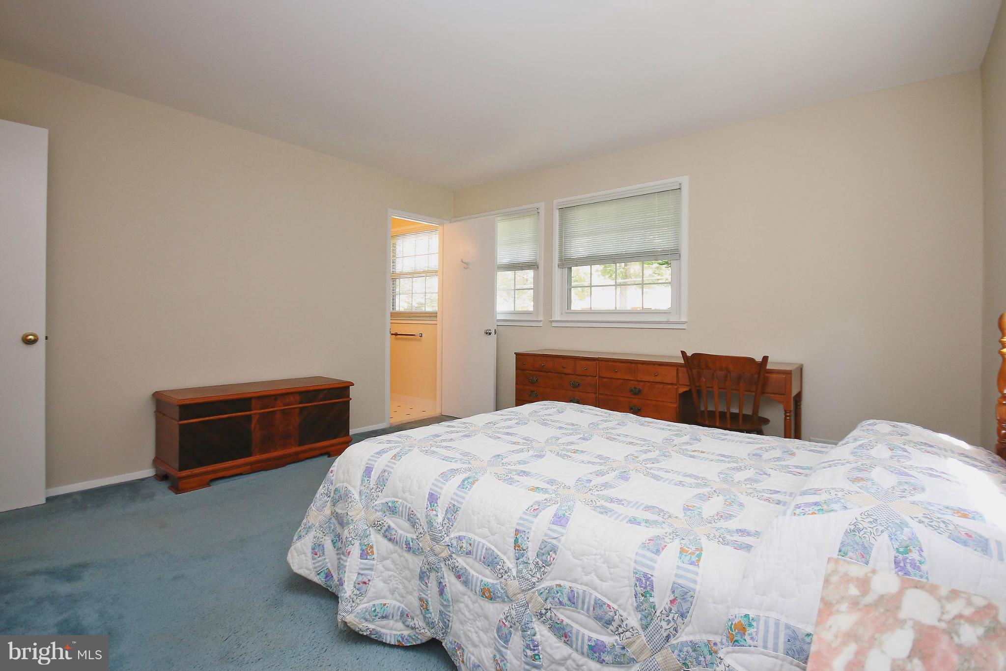 7927 Ellet Road Springfield, VA 22151 - Photo 16 of 30 a bedroom with a bed and a window