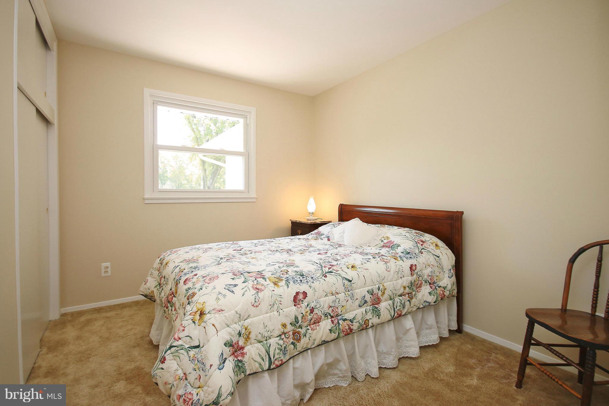 7927 Ellet Road Springfield, VA 22151 - Photo 19 of 30 a bedroom with a bed and a window