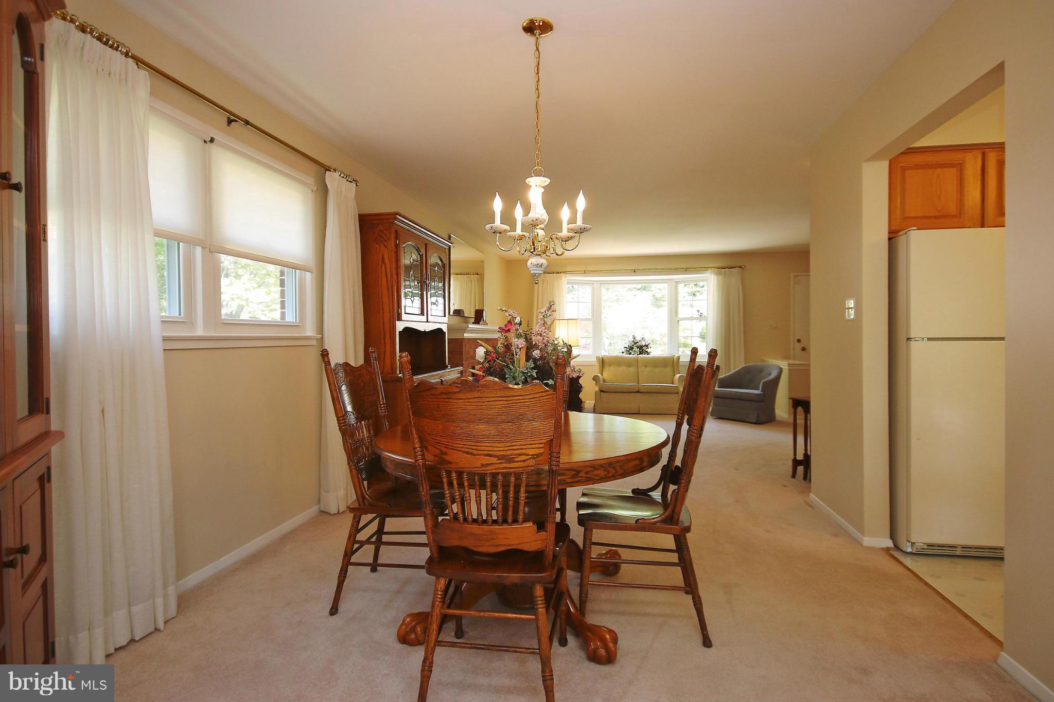 7927 Ellet Road Springfield, VA 22151 - Photo 8 of 30 a dining room with furniture and window