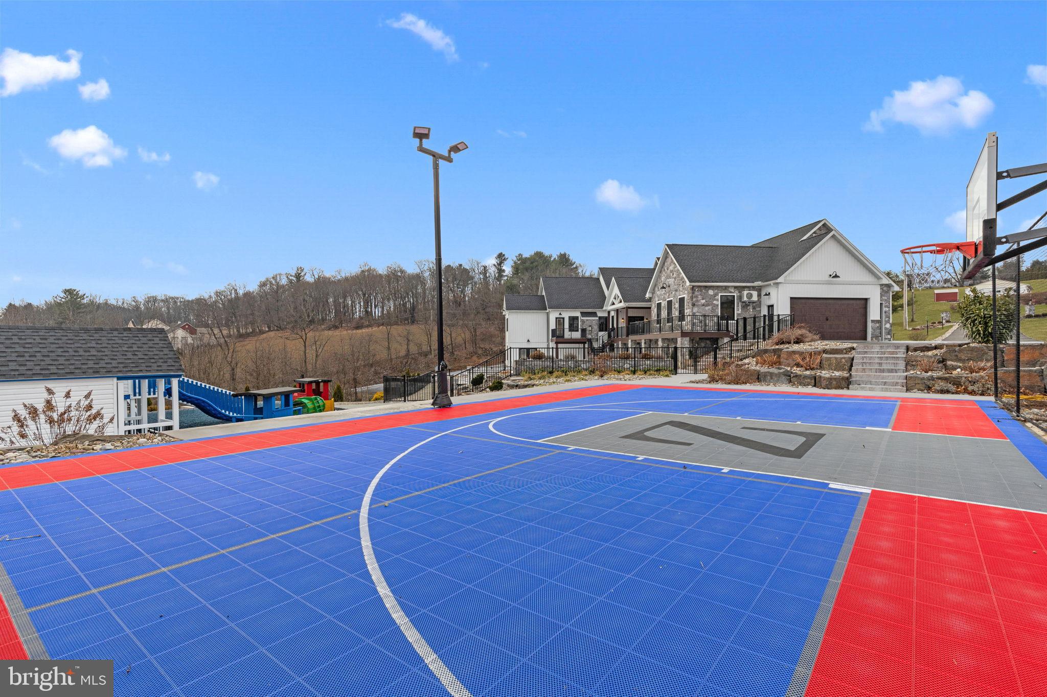 176 Fenstermaker Road Kutztown, PA 19530 - Photo 131 of 149 Vibrant outdoor basketball court with views.