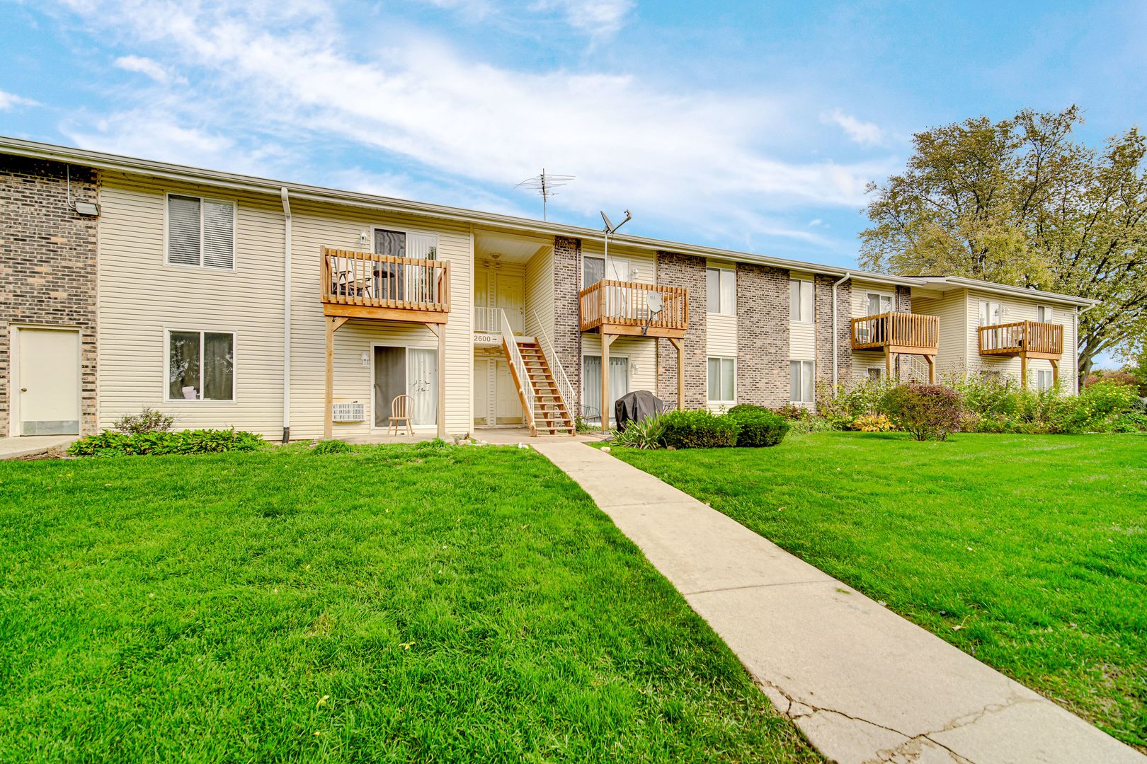 2600 Light Road, Unit 209 Oswego, IL 60543 - Photo 15 of 15 a view of a house with backyard and garden