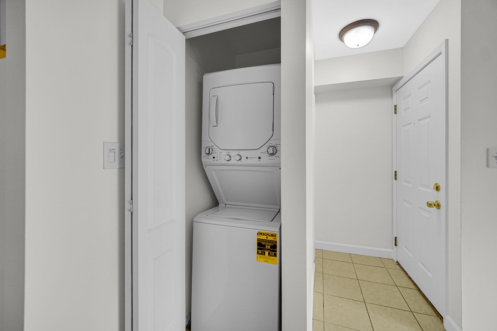 2600 Light Road, Unit 209 Oswego, IL 60543 - Photo 4 of 15 a utility room with dryer and washer