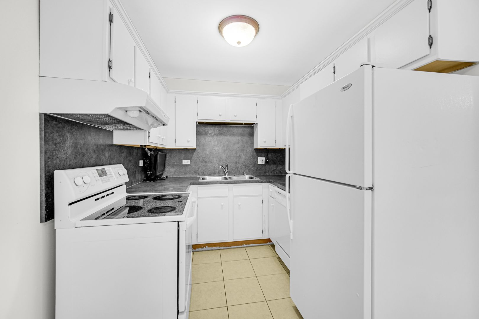 2600 Light Road, Unit 209 Oswego, IL 60543 - Photo 7 of 15 a kitchen with a refrigerator and a stove