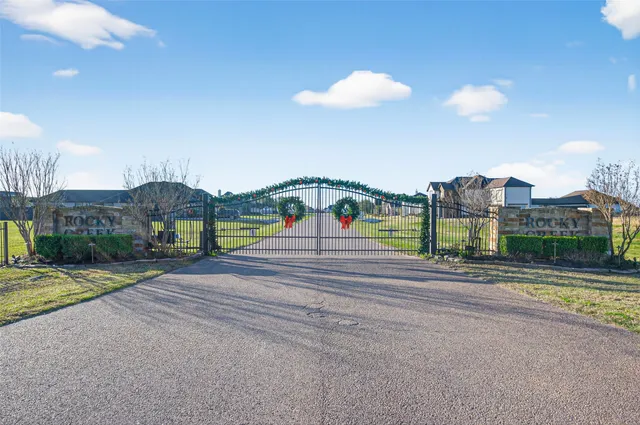 a view of a building with a yard