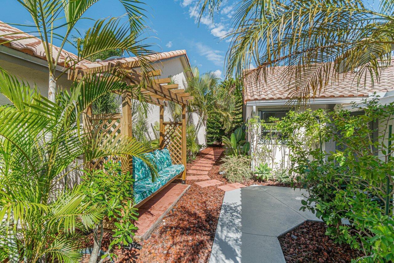5539 Eton Court Boca Raton, FL 33486 - Photo 6 of 41 LUSHLY LANSCAPED COURTYARD