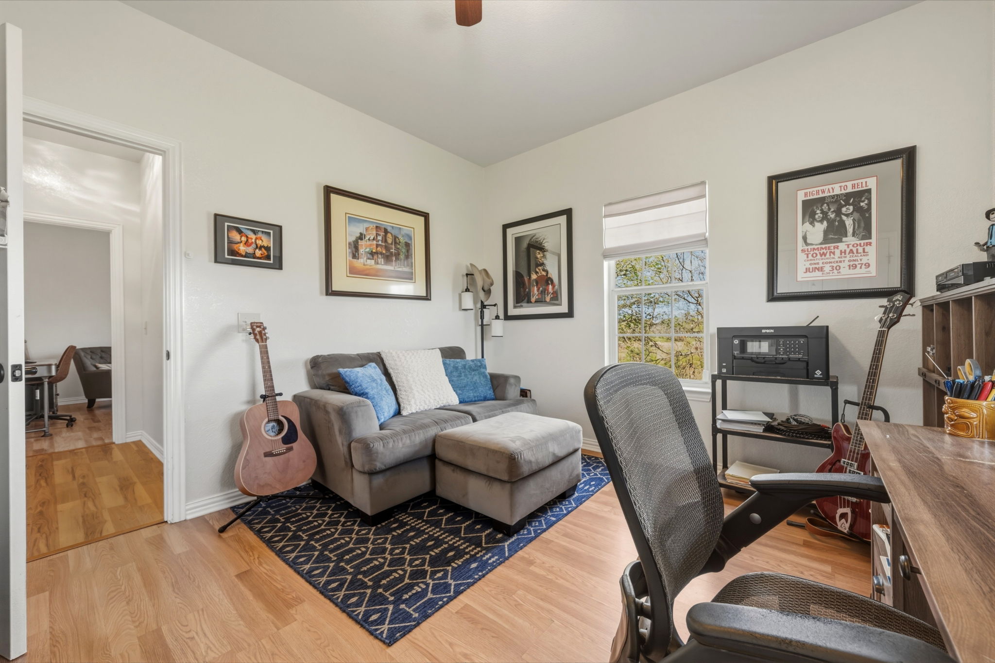 1516 Old Luling Road Lockhart, TX 78644 - Photo 17 of 39 Bedroom or Home office with light wood-style floors and a ceiling fan