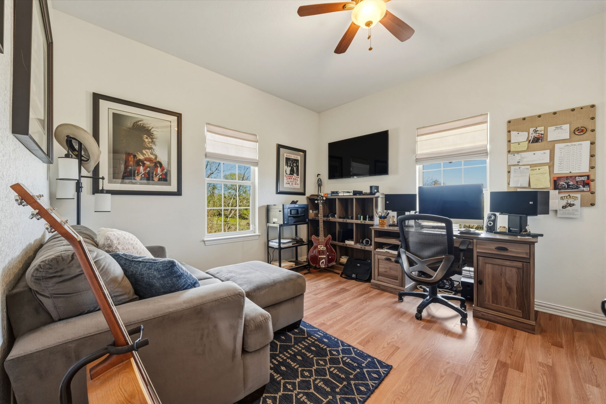 1516 Old Luling Road Lockhart, TX 78644 - Photo 18 of 39 Bedroom or Home office with light wood-style flooring and a ceiling fan