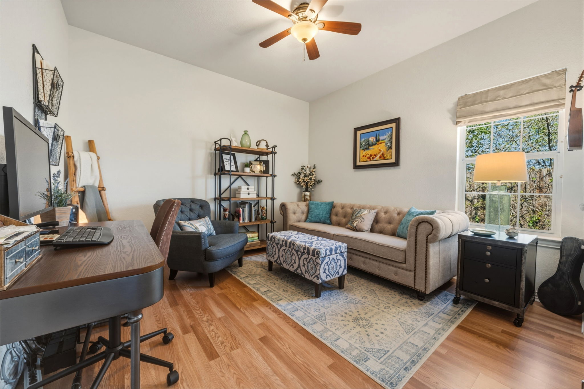 1516 Old Luling Road Lockhart, TX 78644 - Photo 20 of 39 Bedroom or Office area with light wood-style flooring and ceiling fan