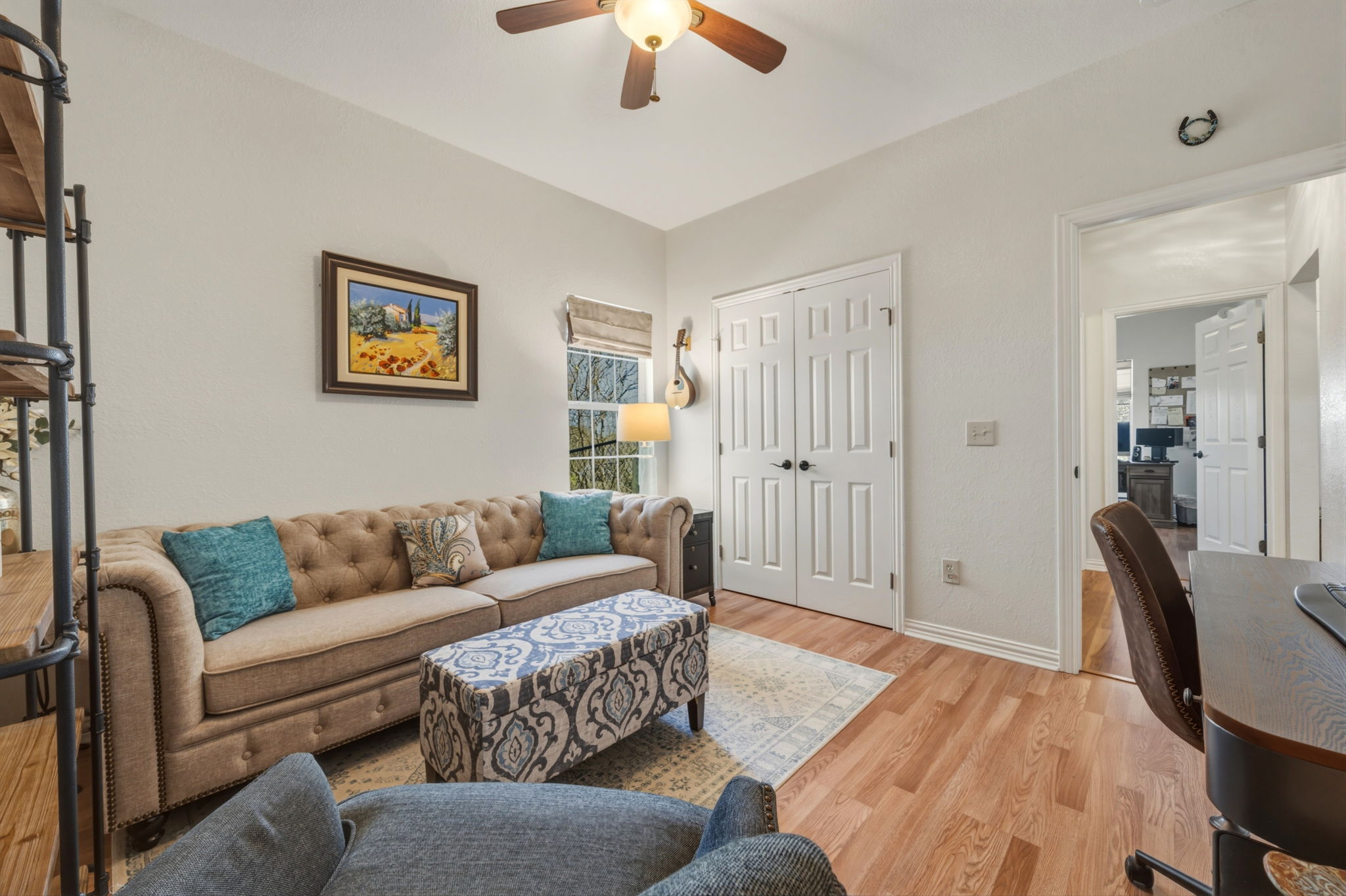 1516 Old Luling Road Lockhart, TX 78644 - Photo 21 of 39 Bedroom or Office room featuring light wood-type flooring and a ceiling fan