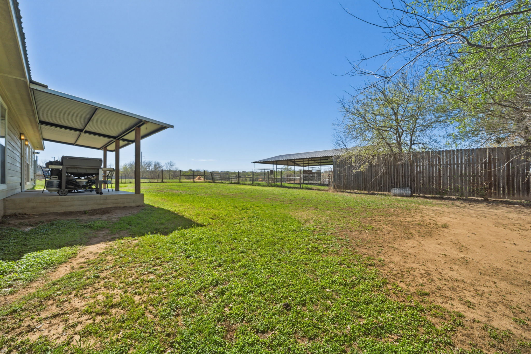 1516 Old Luling Road Lockhart, TX 78644 - Photo 23 of 39 View of Covered Patio, yard and Barn