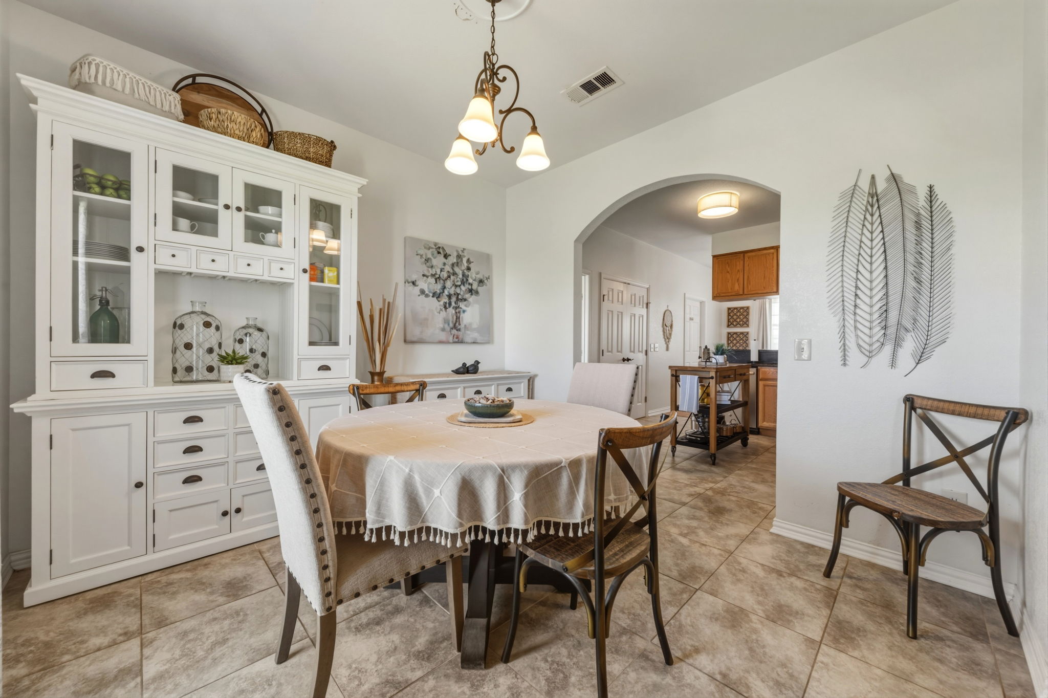 1516 Old Luling Road Lockhart, TX 78644 - Photo 3 of 39 Formal Dining room with arched walkway to Kitchen and tile flooring