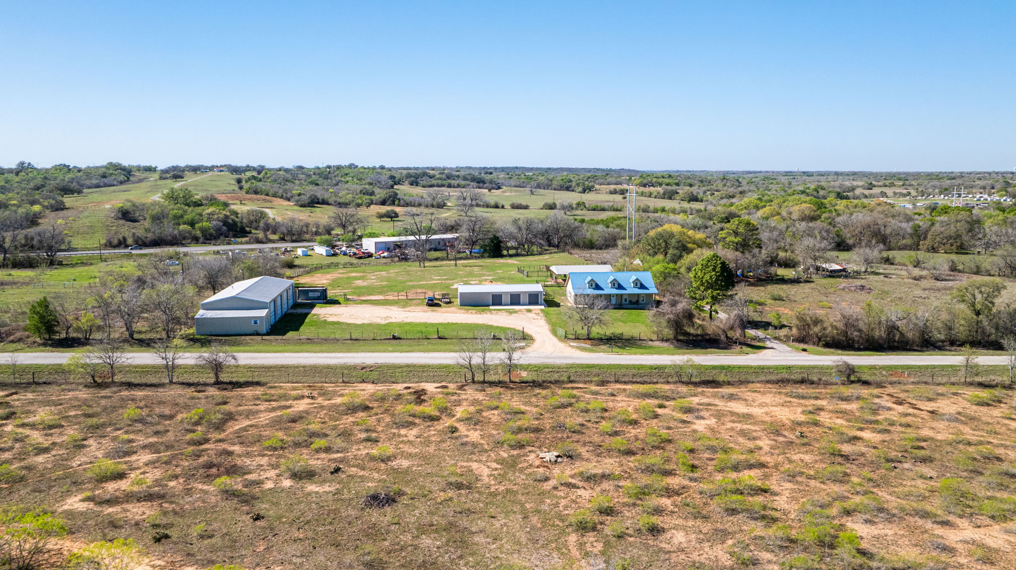 1516 Old Luling Road Lockhart, TX 78644 - Photo 37 of 39 Aerial view of the 3.79 Acre property and buildings. No restrictions!