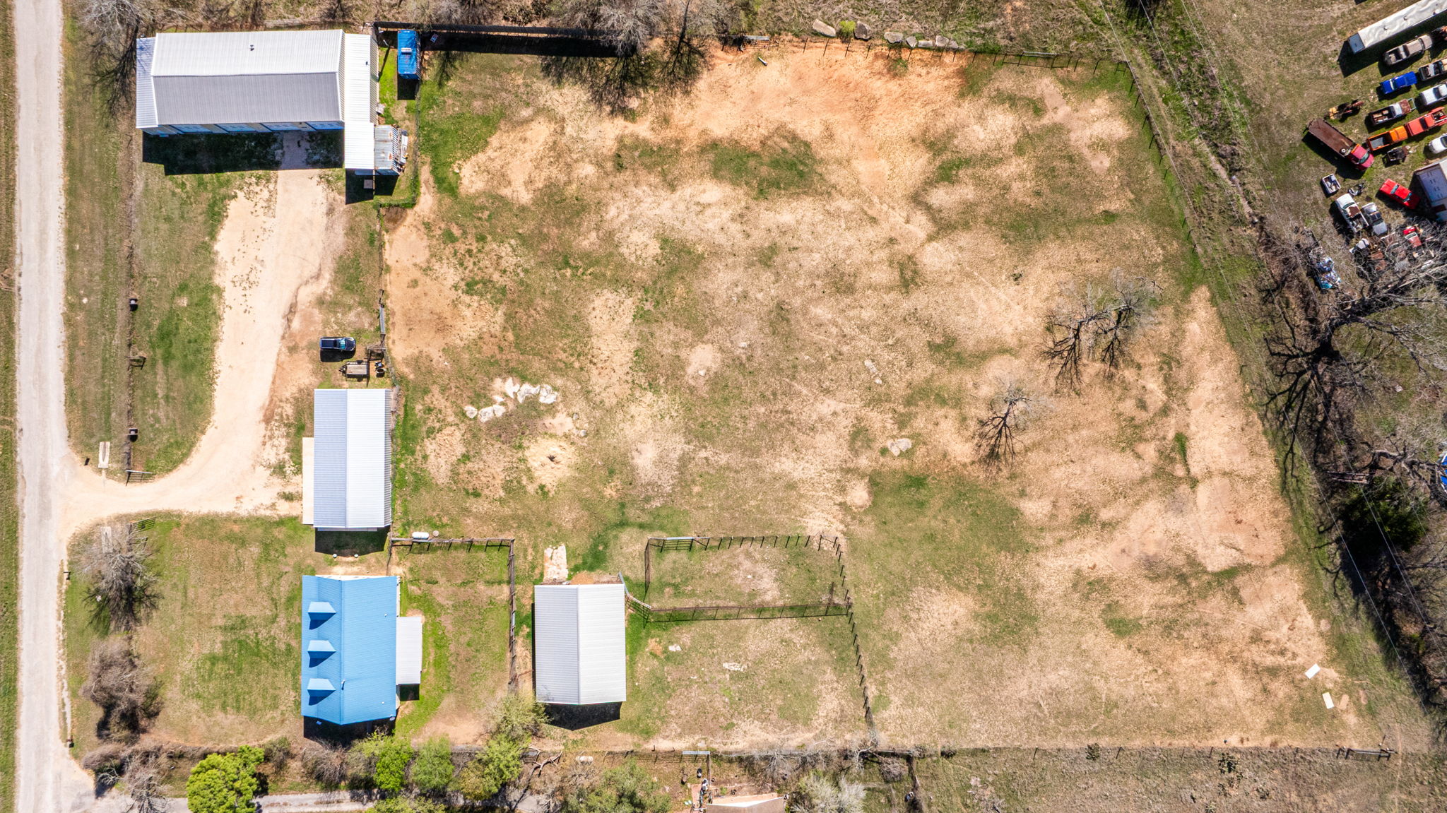 1516 Old Luling Road Lockhart, TX 78644 - Photo 39 of 39 Drone / aerial view of Unrestricted 3.79 acres and buildings