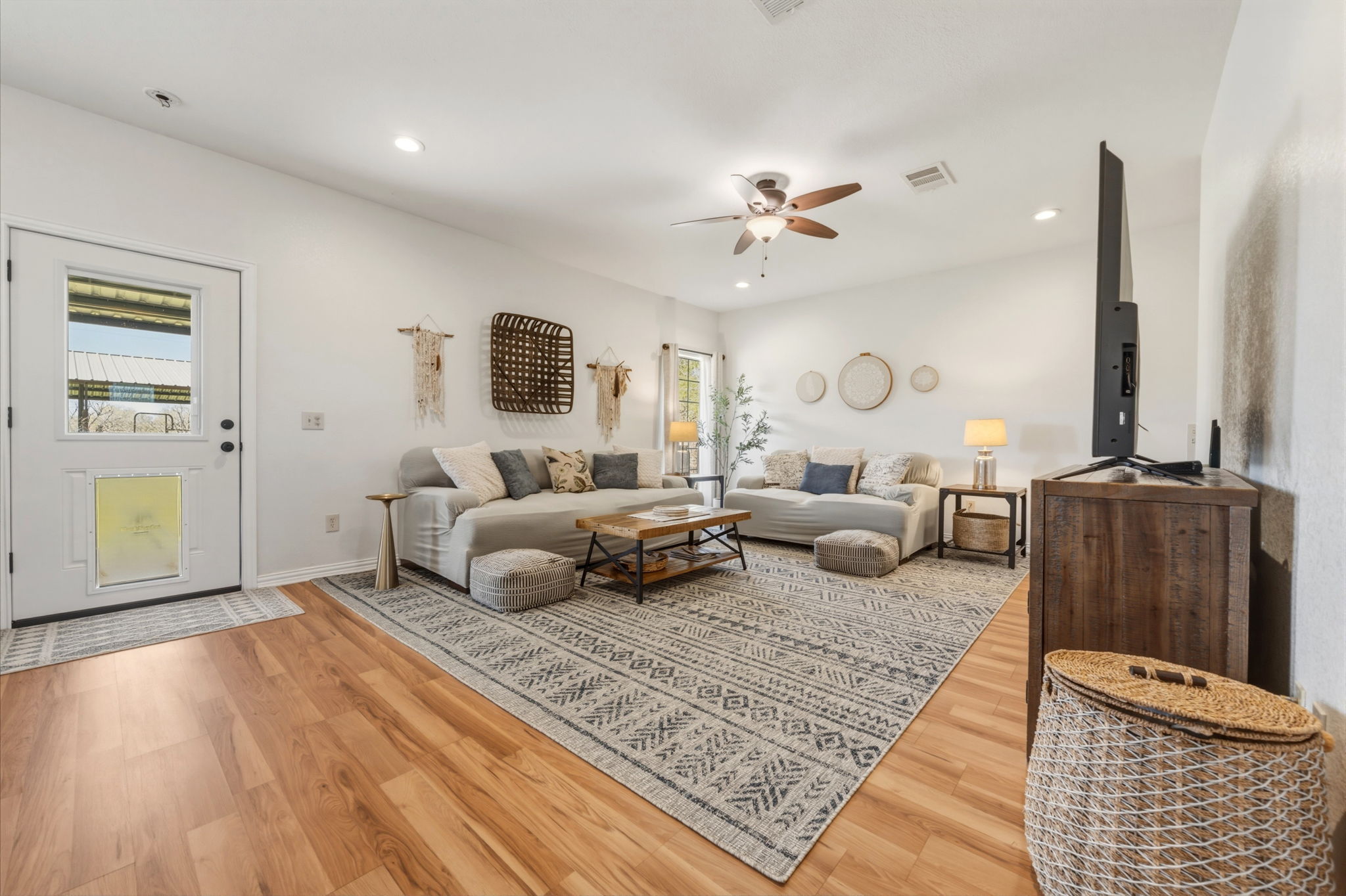 1516 Old Luling Road Lockhart, TX 78644 - Photo 8 of 39 Living area with door to the Patio, wood-style floors, ceiling fan and recessed lighting