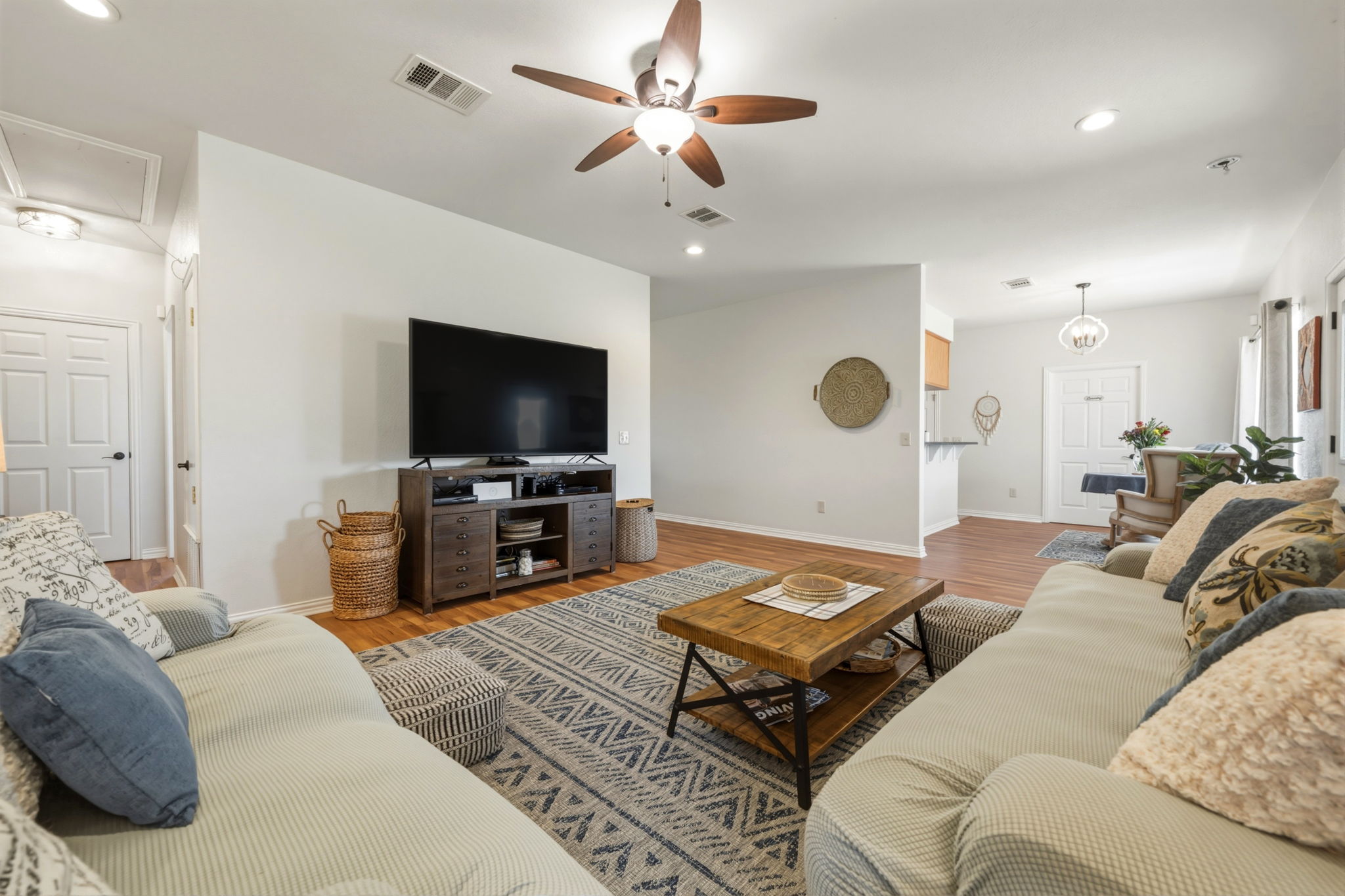 1516 Old Luling Road Lockhart, TX 78644 - Photo 9 of 39 Living room with ceiling fan, recessed lighting, wood-style floors and open to the Breakfast area