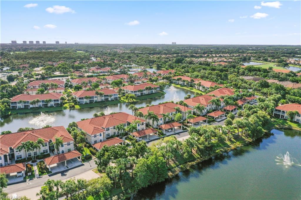23741 Old Port Road, Unit 204 Estero, FL 34135 - Photo 26 of 46 an aerial view of city and lake