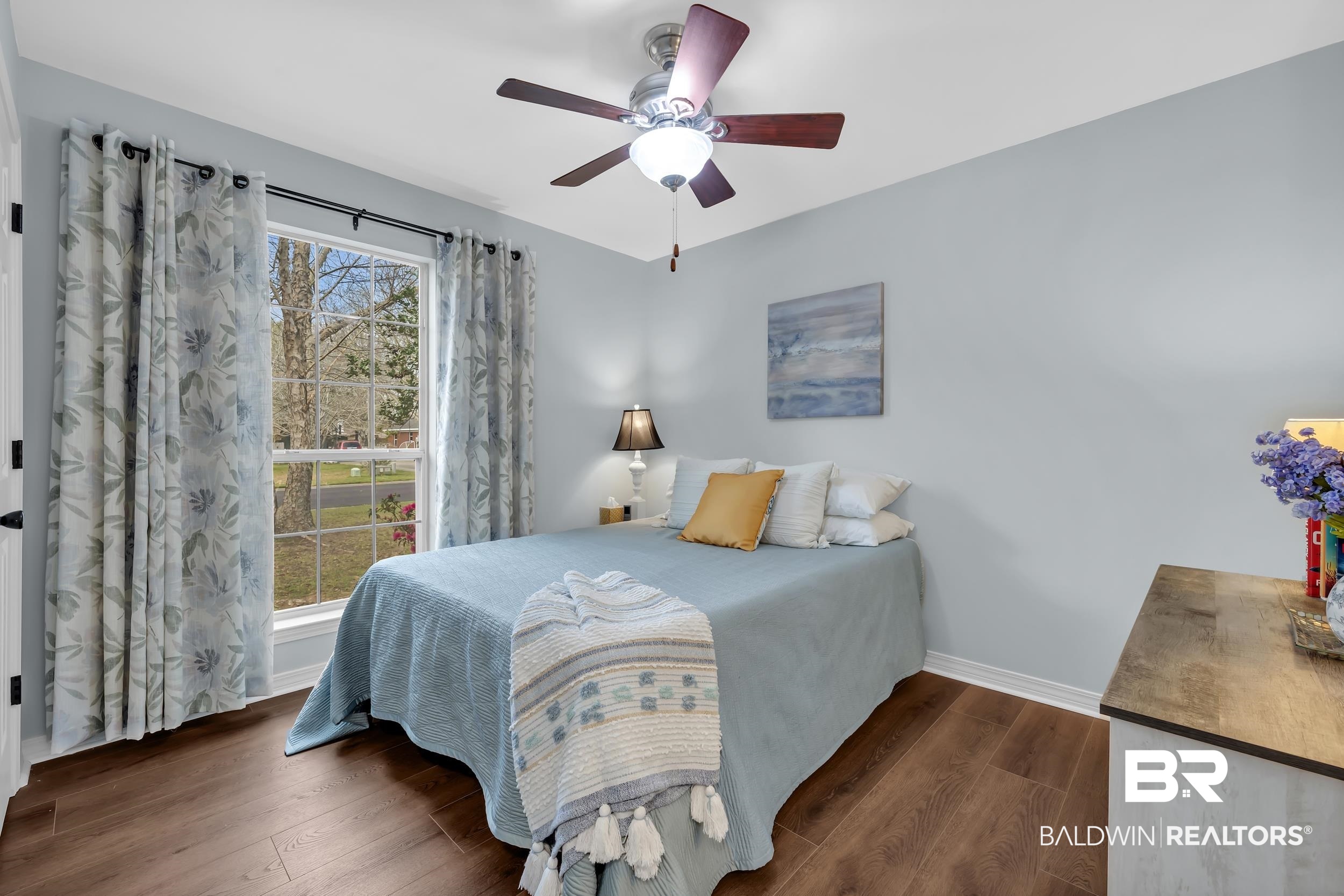 191 Robbins Boulevard Daphne, AL 36526 - Photo 13 of 24 Bedroom featuring dark wood finished floors and ceiling fan