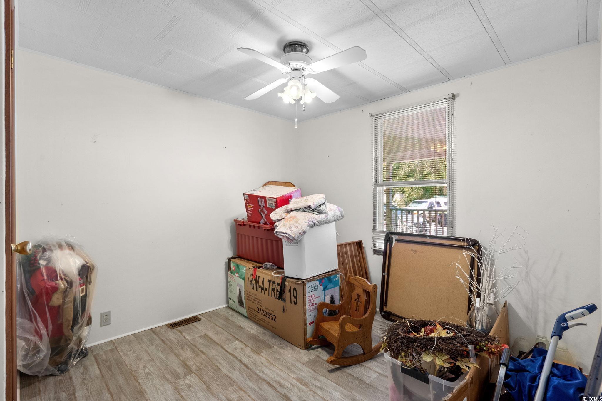 125 Moultrie Court Murrells Inlet, SC 29576 - Photo 22 of 40 Storage room featuring a ceiling fan